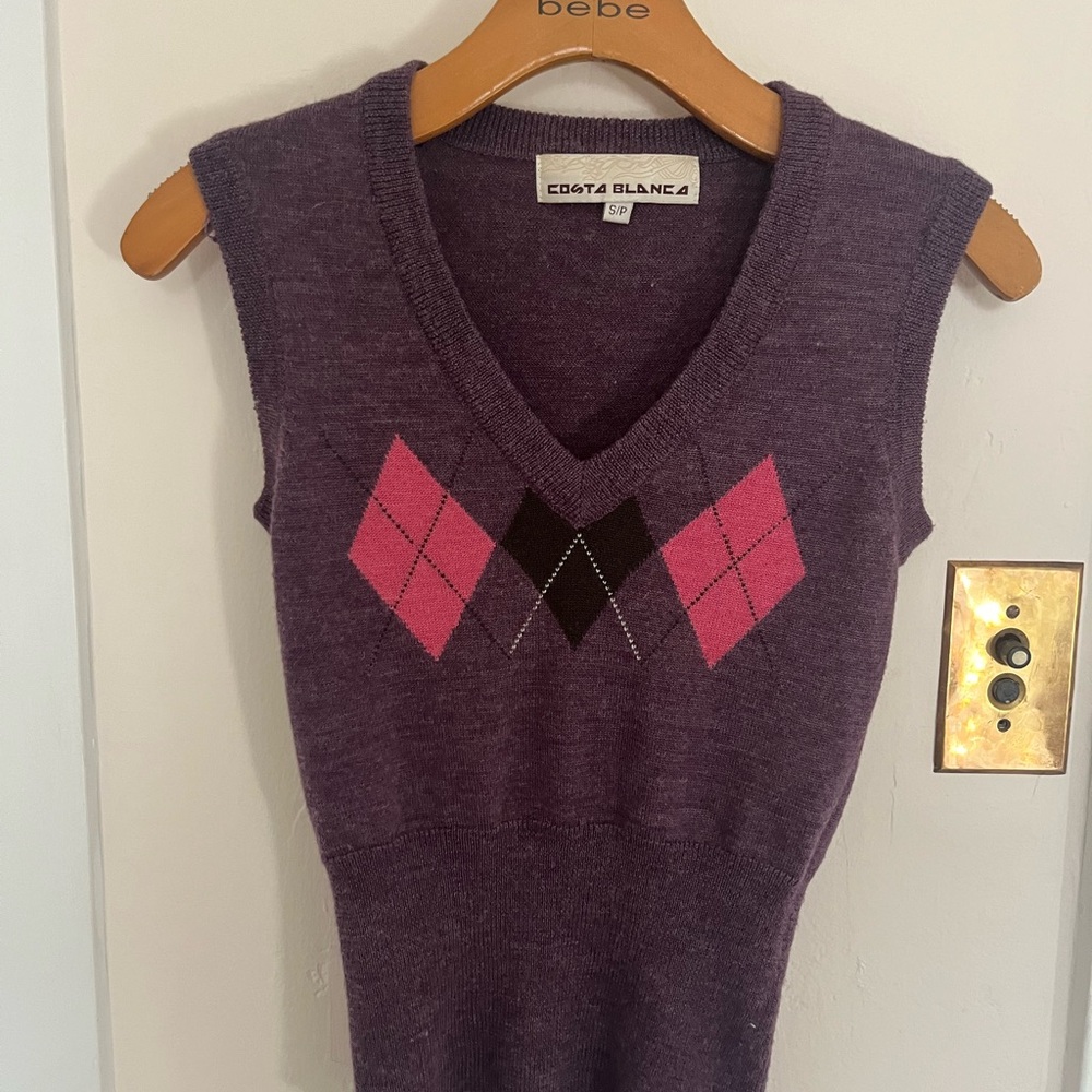 purple and pink argyle vest. very fitted and flattering with v neckline.